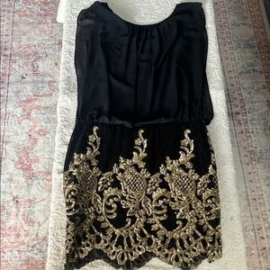 Rubber Ducky Productions, Inc. Black and Gold Lace Design